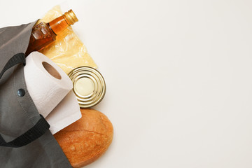 Food donations products on light background, top view with copy space