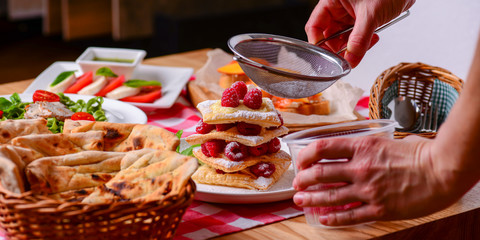 Italian cuisine. Different traditional Italian dishes and desserts on table.