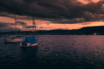 sunset in the harbor at the lake zürich in switzerland