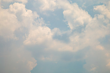 Naklejka na ściany i meble White clouds in blue sky in summer day.