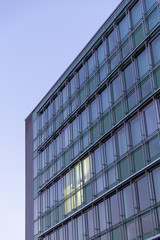 Obraz premium Facade of a Corporate Building during sunrise