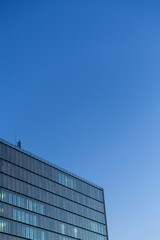 Fototapeta na wymiar Facade of a Corporate Building during sunrise