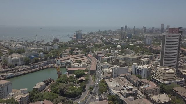 A aerial view of Mumbai as Stock exchange building and gateway of India, Taj Mahal Hotel can be seen in the horizon