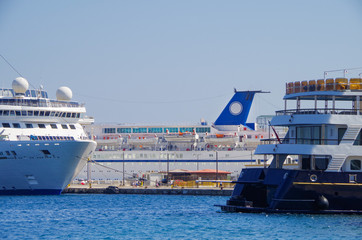 Cruiseships or cruise ship liners in port of Rhodes, Greece during Mediterranean cruising to the...