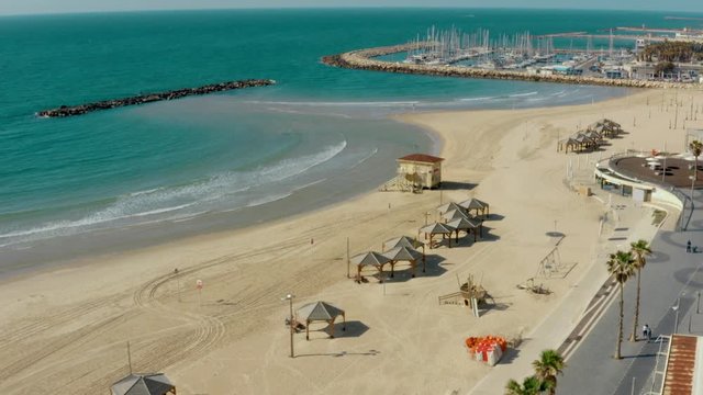 Aerial: Tel Aviv lockdown, quiet Gordon Beach and Marina Boats due to COVID-19 pandemic, aerial