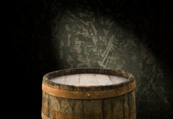 Old wooden barrel on a brown background