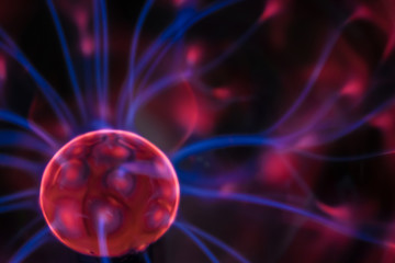 abstraction of the birth of a new planet. Technological background. An abstract image of chaotically moving blue lightnings around a circle. No focus.