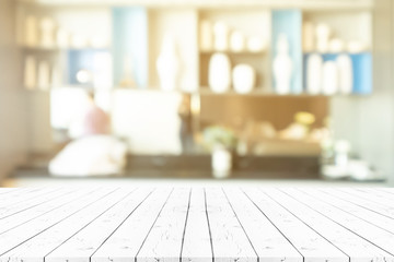 Perspective empty white wooden table on top over blur background, can be used mock up for montage products display or design layout.