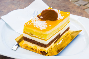chocolate and mango multilayer parfait with hedgehog decoration