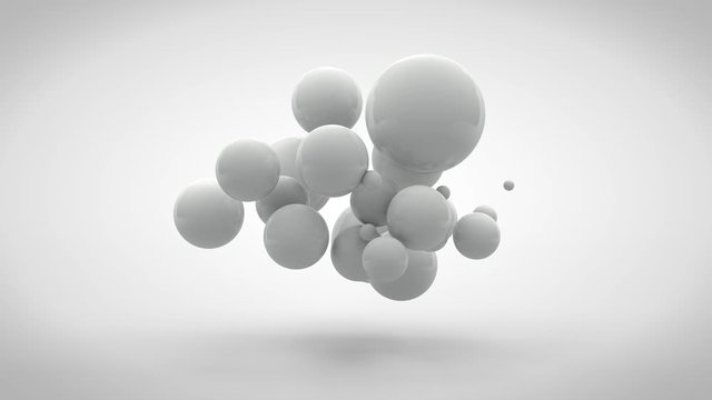 3D animation of a cube that splits into several cubes. Cubes turn into spheres that are randomly distributed in space and disappear. Animation with the ability of continuous playback.