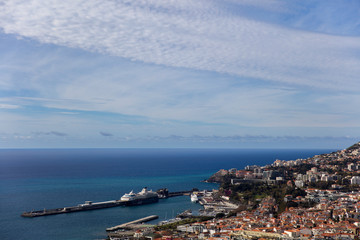 Fototapeta premium Distant view at town Funchal on Madeira island, Portugal