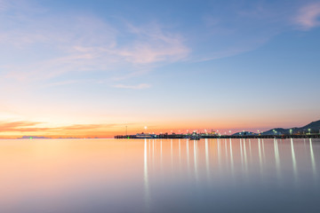 Fototapeta na wymiar Panoramic tropical blue sea sky sunset with golden light at Samui island pier background ,long exposure