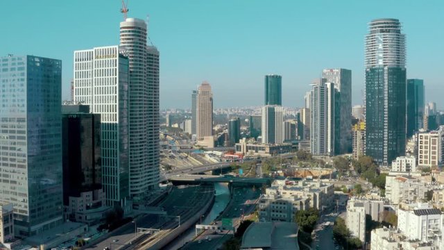Ayalon Freeway through Tel Aviv city Israel, aerial skyline reveal