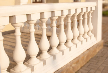 Balusters, architectural forms, decorative solutions, ancient columns. The concept of using architectural solutions.