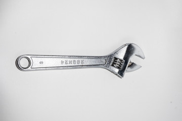 Chrome wrench on white background