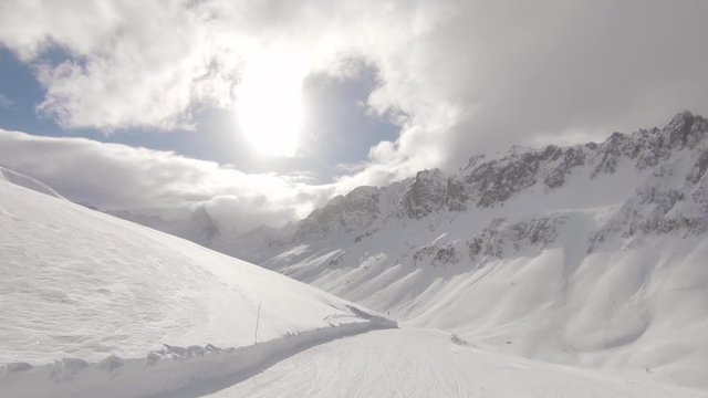 Nice view of an empty ski slope on a peaceful, sunny day