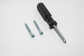 Old figure screwdrivers on white background