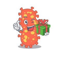 Smiling bacteroides cartoon character having a green gift box
