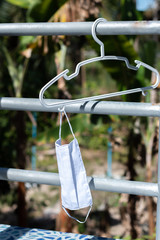 Cloth mask  washed and hung in the sun.