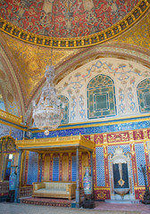 Fototapeta na wymiar The Imperial Hall in Topkapi Palace Harem in Istanbul, Turkey. Also known as the Imperial Sofa, the Throne Room Within or the Hall of Diversions, it includes blue and white Delftware tiles 
