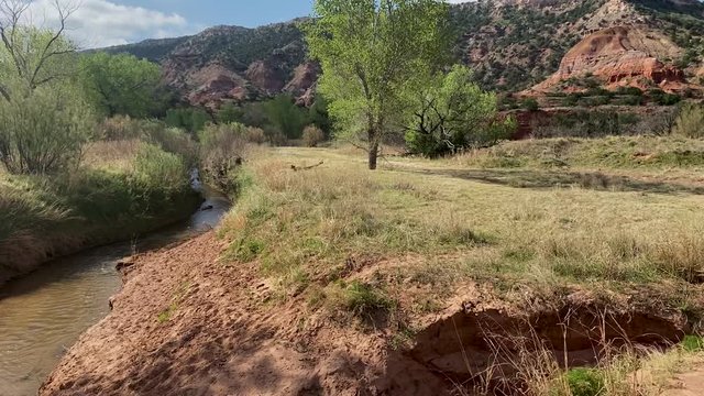 Eye level truck shot of valley floor in Palo Duro Canyon State Park, Texas