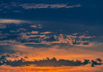 Scene with sunset on a summer afternoon with clouds