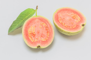 Fresh red heart guava(bulp) cut on white background.