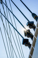 Tightened cable threaded connections in the fastening of the bridge structure in sunlight