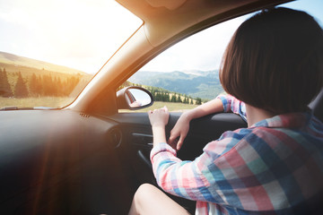 girl traveling in a car