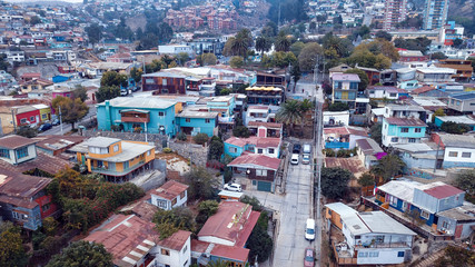 Fototapeta na wymiar Aerial View to the Colofrul and Bright Buildings and Streets of Valparaiso, Chile