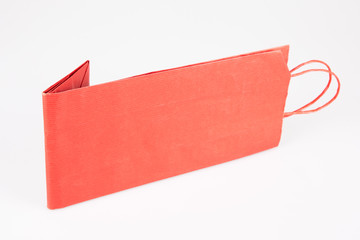 red blank shopping bag mockup in white background