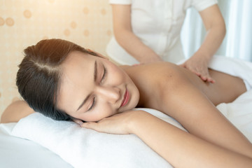 Fototapeta na wymiar Young Woman during Spa Salon Body massage Hands Treatment.