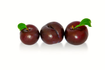 plums on a big background, isolate. bright plums black or red without background.