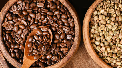 Close up of coffee beans in wooden bowl for background