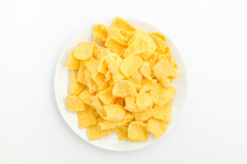 Chips made of corn on a white background