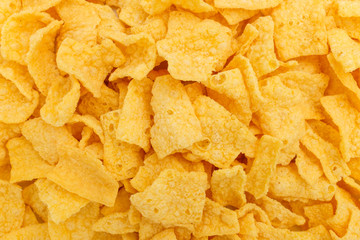 Chips made of corn on a white background