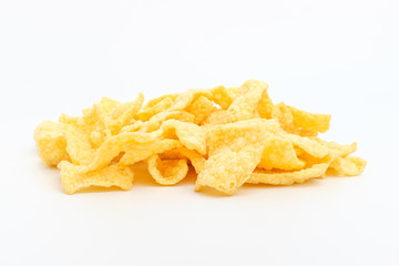 Chips made of corn on a white background