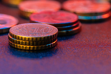 Euro coin on stock chart. Financial investment concept. Close up.