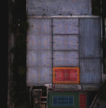 Aerial drone shot over basketball courts in a sports complex in Poseidonio, Thessaloniki Greece