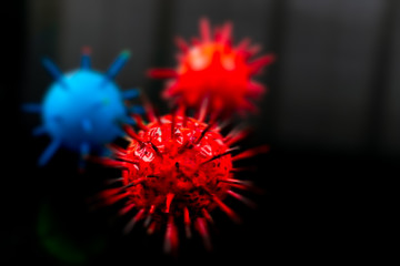 Abstract scientific background. High magnification view of virus cells red and blue on black background