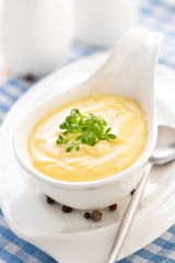 Hollandaise sauce. Classic French cuisine sauce. Emulsion sauce of butter and egg yolks with vinegar.