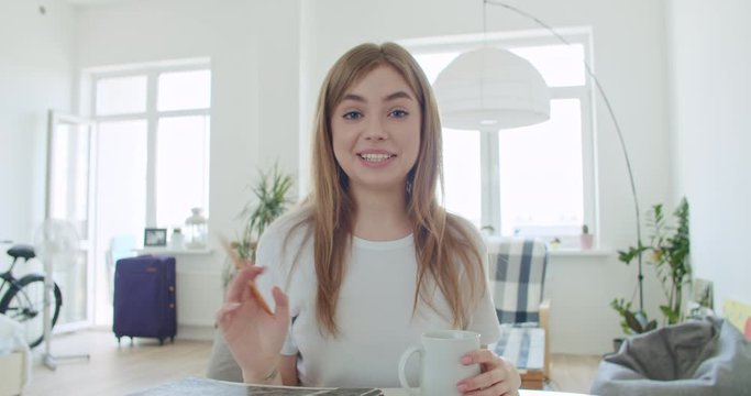 Young woman makes video conference