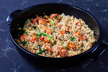 Thai street food: fried rice with shrimp, close-up