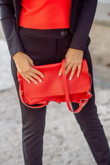 Summer bag Italian style in the hands of a woman
