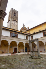 Italy, Florence, Badia a Passignano. View of the cloister of the abbey of San Michele Arcangelo in Passignano, a monastery located on the Chianti hills in Badia a Passignano in Tuscany
