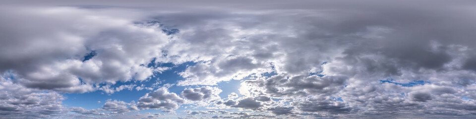 Seamless hdri panorama 360 degrees angle view blue sky with beautiful evening fluffy cumulus clouds...