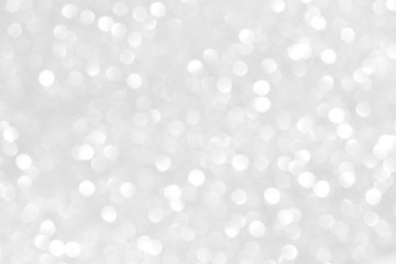 Gray light festival bokeh texture background.  Concept for winter season, New Year, Christmas and All Celebrations.
