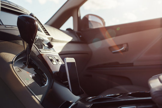 Smart Phone Phone On The Car Seat Dashboard