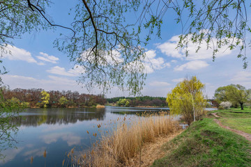Fototapeta na wymiar Autumn landscape on the banks of the Kharkov river with reflection