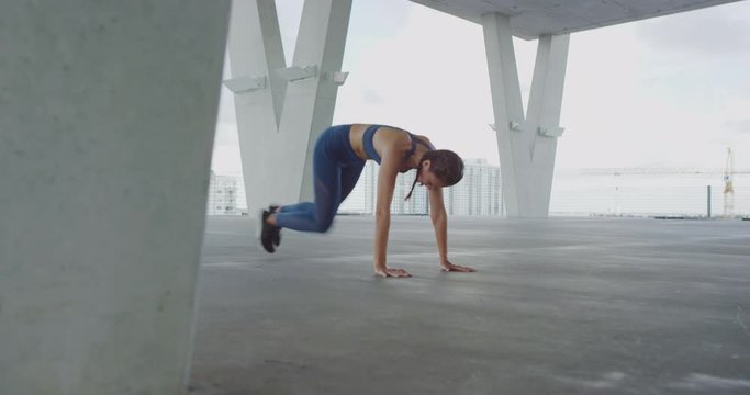 Girl doing core workout in garage